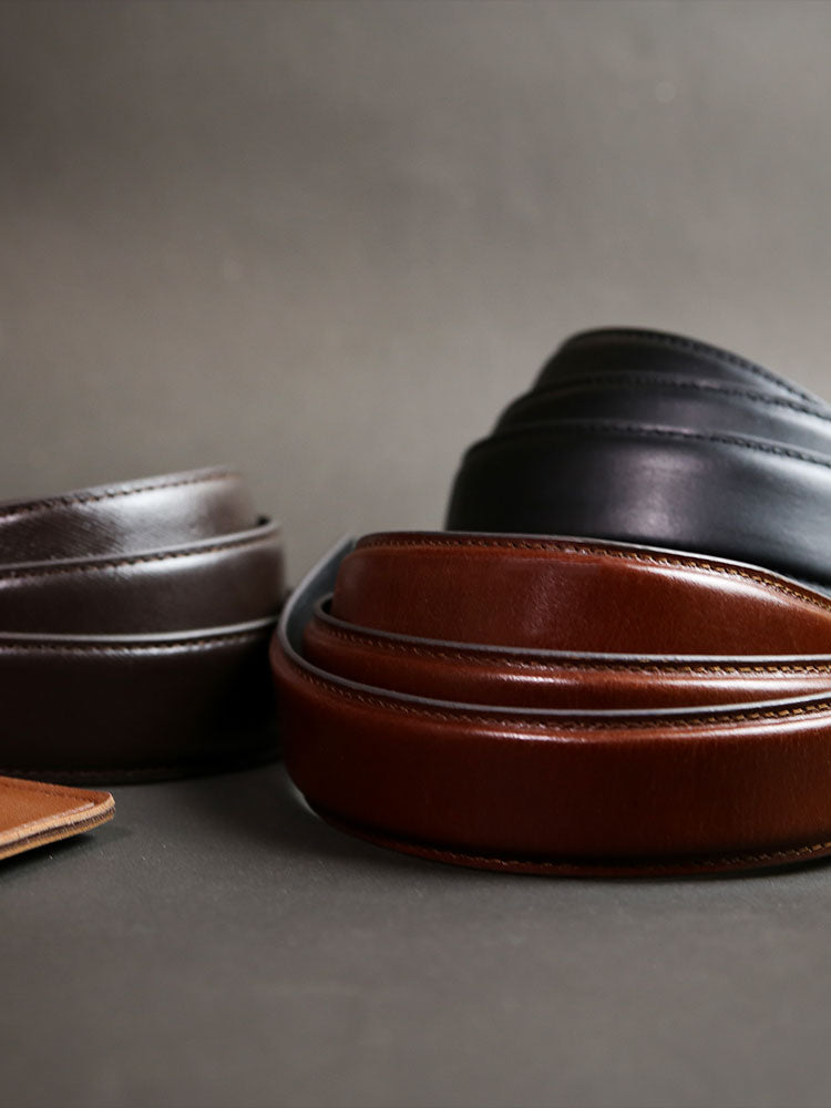 Brown leather strap with two rows of stitching, featuring an Italian leather design and a no-hole strap for adjustable fit. 
belt without holes, ratchet belt strap, leather straps, ratchet belt strap only, adjustable strap, belt strap without holes, belt strap without buckle, micro adjustable belt strap	

