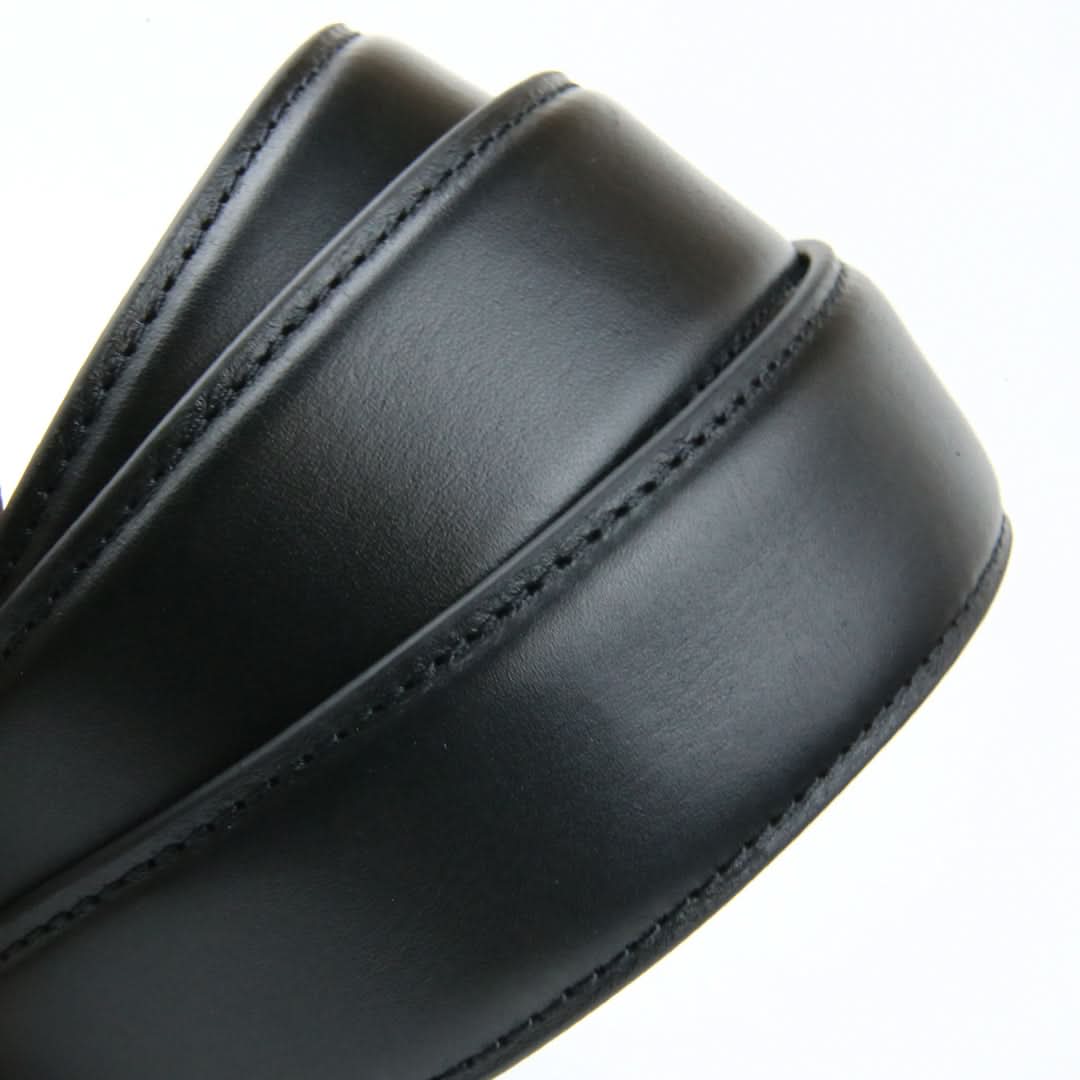 A close-up of a black ratchet leather belt strap, showcasing its adjustable design without holes.
belt without holes, ratchet belt strap, leather straps, ratchet belt strap only, adjustable strap, belt strap without holes, belt strap without buckle, micro adjustable belt strap	
