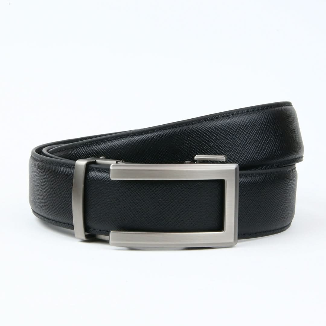 A sleek ratchet belt featuring a textured leather strap with line patterns and a stylish silver buckle.